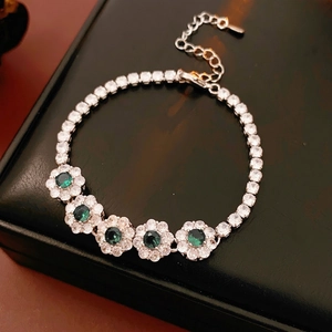 Bracelet fleurs en zircon vintage français avec pierres vert émeraude sur cuir