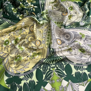 Green and yellow floral printed silk shawl with intricate geometric patterns