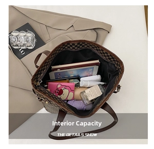 Internal view showing large capacity for tablet, umbrella and makeup in tote bag