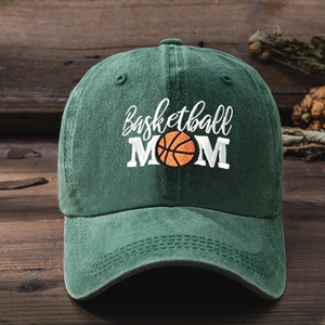 Close-up of Basketball MOM embroidery on dark green washed cotton baseball cap