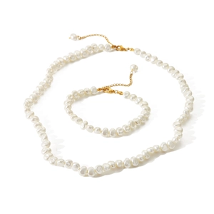 Elegant French vintage irregular baroque pearl necklace and bracelet set with gold hardware