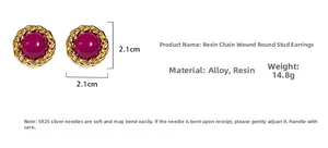 Macro detail of vintage gold chain earrings with magenta resin, 2.1cm diameter size