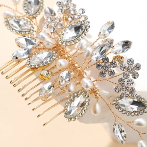 Bridal hair comb with gold wires, sparkling rhinestones and white pearls for wedding hair