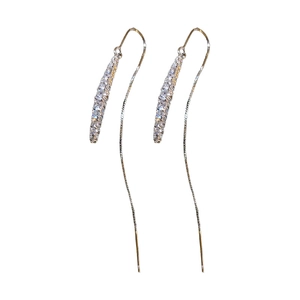 Silver drop zircon chain tassel threader earrings with curved pave accents on white background