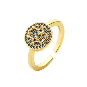 Exaggerated gold-plated Hamsa ring with blue micro-pave zircons and adjustable open band