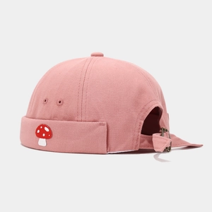Pink cotton docker hat featuring a cute mushroom embroidery patch and adjustable back strap