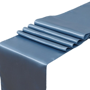 Elegant blue satin table runner with glossy texture for wedding and hotel decor