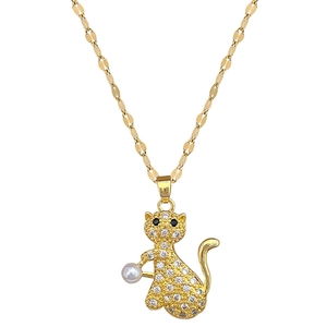 Luxurious gold cat pendant necklace with crystals and white pearl on flat link chain