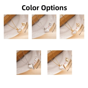 Detail showing five variations of double-sided heart pendants on steel necklaces