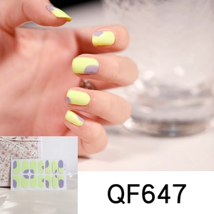 Detail of yellow and purple cow pattern nail stickers QF647 with hand model view