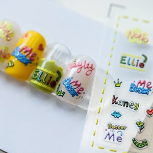 3D embossed nail stickers featuring colorful lettering and cute hand-drawn icons
