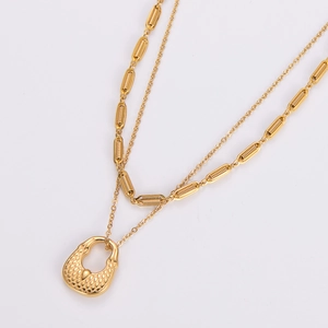Elegant gold-tone double-layered necklace featuring a woven textured crescent pendant
