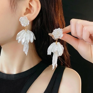 Elegant white petal drop earrings with long beaded tassels and luxury pearly finish