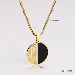 Detail showing 27mm gold round pendant with clear crystals and black enamel finish