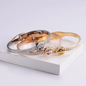 Three-tone Roman numeral bracelets with crystals in gold, silver, and rose gold finishes
