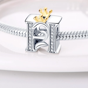 Silver letter H charm bead with gold crown and crystals on a snake chain bracelet
