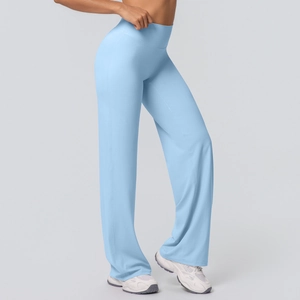 Detailed shot of high-waisted wide-leg yoga pants in light blue soft matte fabric