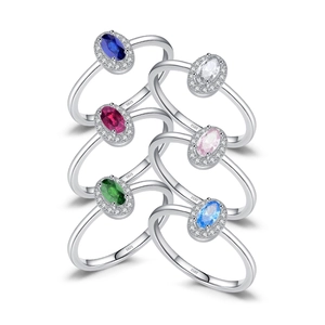 Set of six S925 sterling silver rings with colorful oval stones in halo settings