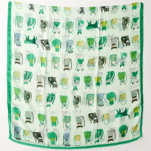 Detail of cute green cat prints on light green satin cotton scarf for women