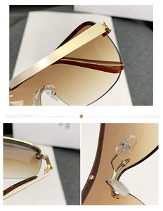 Detailed close-up of golden metal hinges and silicone nose pads on cycling sunglasses