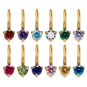Detailed view of twelve colorful round cut birthstone zircon charms in gold finish