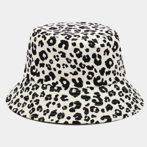 Close-up of leopard print corduroy fabric texture and stitching on the bucket hat