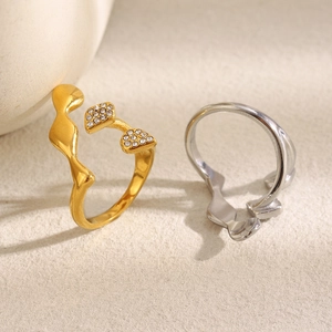 Minimalist 18K gold and silver wavy open rings with cubic zirconia stones
