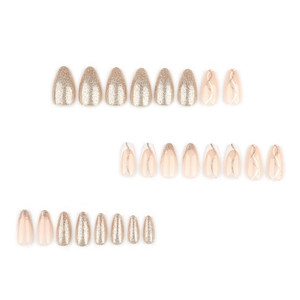 Glittery gold almond press-on nails with elegant wavy lines and a glossy finish