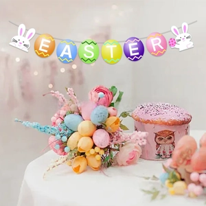 Close-up of Happy Easter glitter banner with macaron eggs and rabbit decor for parties