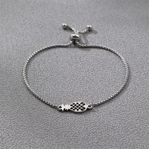 Detail of silver pineapple pendant on adjustable box chain made of stainless steel