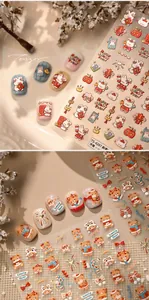 Detail of 3D embossed nail stickers featuring festive rabbits, teddy bears and lucky icons