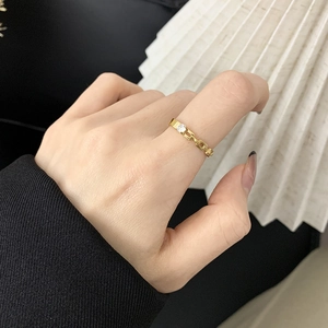 Minimalist 18K gold plated titanium chain ring with a sparkling round zircon stone