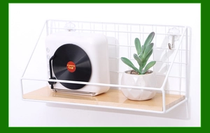 Detail of Nordic white iron wall shelf with light wood base and minimalist grid design