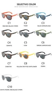 Collection of children's plastic camouflage sunglasses in ten different patterns and colors