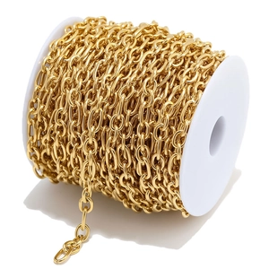 Golden stainless steel oval link chain on a spool for DIY jewelry making and crafts