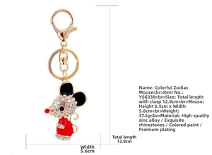 Detail of crystal mouse keychain featuring red and black enamel with sparkling rhinestones