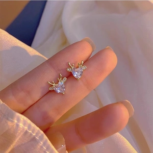 Golden reindeer antler stud earrings with sparkling heart-shaped zircon stones