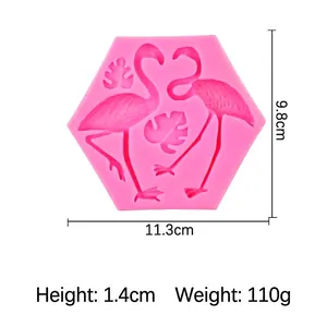 Pink silicone mold with flamingo and tropical leaf patterns for baking and DIY crafts