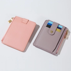 Slim PU leather card holder with zipper pocket and snap closure in pink and purple
