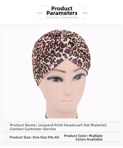 Detail of leopard print turban hat with elegant front twisted knot and pleated knit fabric