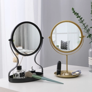 Nordic desktop makeup mirror with gold and black metal frames and jewelry storage base