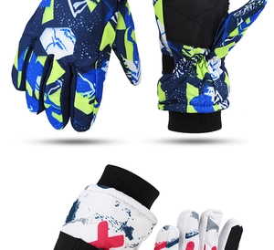 Detail of waterproof ski gloves featuring blue camouflage and white red patterns