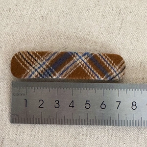 7.5cm rectangle plaid hair clip in brown and blue felt fabric shown with a measuring ruler