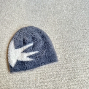 Winter plush knit beanie with white bird jacquard pattern for kids outdoor warmth