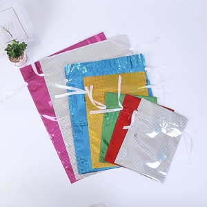 Various sizes of colorful laser drawstring gift bags with metallic glossy finish