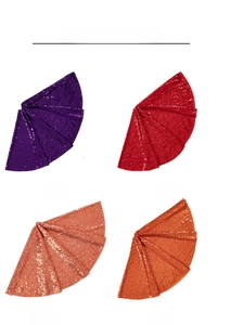 Detail view of sequin tree skirts in purple, red, rose gold and orange shades