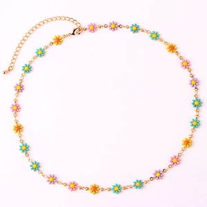 Detail of 18K gold chain necklace with colorful enamel daisies and lobster clasp