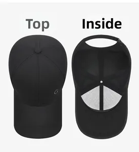 Detail view of the black baseball cap showing the top structure and breathable mesh lining