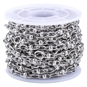 Silver stainless steel oval bead link chain for DIY jewelry making on white spool