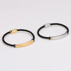 Minimalist braided leather bracelet with gold and silver magnetic metal clasps